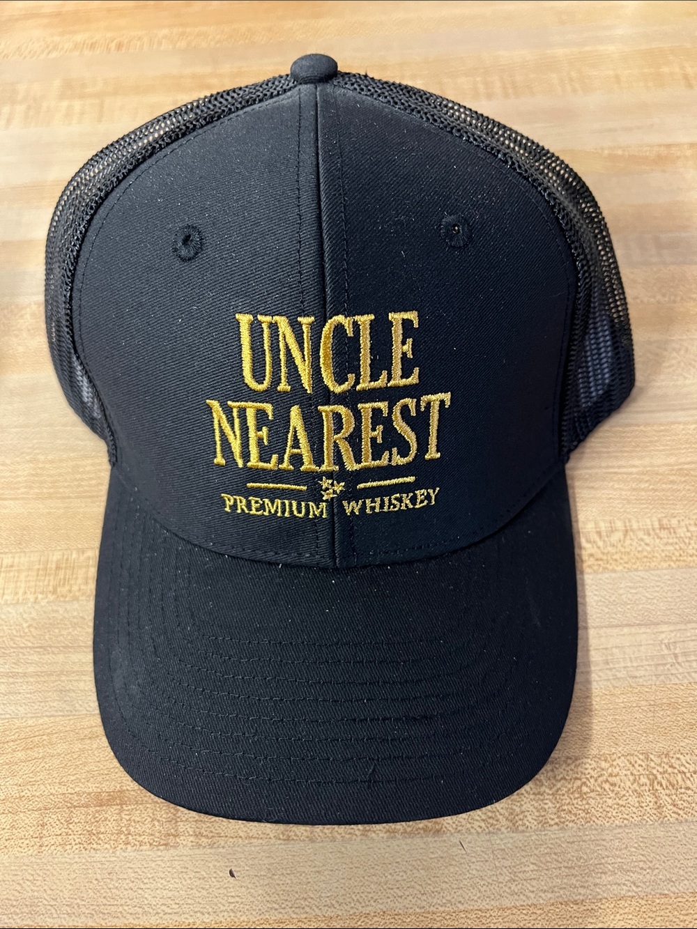 Uncle Nearest Black and Gold Trucker Hat - Premium Whiskey